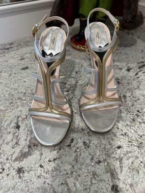 Prada Vintage Leather T-Strap Heels
Size: 37/7; Like new, beautiful condition